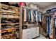 Walk-in closet with custom shelving and drawers provides ample storage space at 4615 Stearman Dr, North Las Vegas, NV 89031