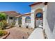 Charming two-story home with a well-manicured lawn and a two-car garage, offering great curb appeal at 4615 Stearman Dr, North Las Vegas, NV 89031