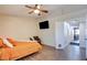 Main bedroom with TV and ensuite bathroom at 4615 Stearman Dr, North Las Vegas, NV 89031