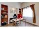 Bright office space with custom bookshelves and large window at 4615 Stearman Dr, North Las Vegas, NV 89031