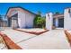 Image of a front entryway with a brick-lined walkway and desert landscaping providing a clean aesthetic at 4742 Monterrey Ave, Las Vegas, NV 89121
