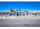 Charming single-story home featuring a two-car garage, desert landscaping, and a secure fenced yard at 4742 Monterrey Ave, Las Vegas, NV 89121