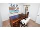 Cozy home office features built-in desk, chair, and view of the outdoor swimming pool at 4742 Monterrey Ave, Las Vegas, NV 89121