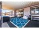 Covered patio featuring an outdoor rug and sliding glass doors for indoor/outdoor living at 4742 Monterrey Ave, Las Vegas, NV 89121