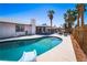 Backyard showcasing a pool with a slide, diving board, and outdoor lounge areas at 4742 Monterrey Ave, Las Vegas, NV 89121