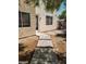 View of the side yard with a stone pathway and access to the entrance at 4821 Whisper Lake Ave, Las Vegas, NV 89131