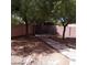 Picture of a backyard with a brick wall, rock garden, and stone path at 4821 Whisper Lake Ave, Las Vegas, NV 89131