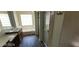 Bathroom with a double sink vanity, shower, and tub under a bright window at 4821 Whisper Lake Ave, Las Vegas, NV 89131