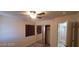 Bedroom featuring ceiling fan, closet, and natural lighting at 4821 Whisper Lake Ave, Las Vegas, NV 89131
