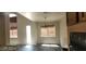 Bright dining room with slate floors, open floor plan, and access to backyard at 4821 Whisper Lake Ave, Las Vegas, NV 89131
