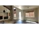 Bright dining room with slate floors, open floor plan, and access to backyard at 4821 Whisper Lake Ave, Las Vegas, NV 89131