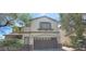 Charming two-story home features a well-manicured front yard and a convenient two-car garage at 4821 Whisper Lake Ave, Las Vegas, NV 89131