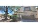Charming two-story home features a well-manicured front yard and a convenient two-car garage at 4821 Whisper Lake Ave, Las Vegas, NV 89131