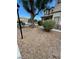 View of the front yard featuring rock landscaping and mature trees at 4821 Whisper Lake Ave, Las Vegas, NV 89131