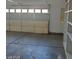 Clean garage with storage shelves at 4821 Whisper Lake Ave, Las Vegas, NV 89131