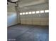 Spacious garage with painted walls and concrete floor at 4821 Whisper Lake Ave, Las Vegas, NV 89131