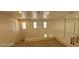 Hallway showcasing neutral walls, white railing, and lots of natural light at 4821 Whisper Lake Ave, Las Vegas, NV 89131