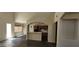 Open concept kitchen with views into the dining and living areas at 4821 Whisper Lake Ave, Las Vegas, NV 89131