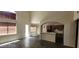 Open floor plan with tile floors, and a view of the connected kitchen at 4821 Whisper Lake Ave, Las Vegas, NV 89131
