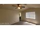 The main bedroom has carpeted floors, neutral walls, and a ceiling fan at 4821 Whisper Lake Ave, Las Vegas, NV 89131