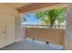 Cozy balcony featuring a storage closet and a view of a lush green tree at 4843 S Torrey Pines Dr # 101, Las Vegas, NV 89103
