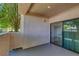 Private balcony with sliding glass doors and views of the community landscape at 4843 S Torrey Pines Dr # 101, Las Vegas, NV 89103