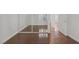 Bedroom with wood floors and closet with mirrored doors at 4843 S Torrey Pines Dr # 101, Las Vegas, NV 89103