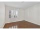 Neutral bedroom with plantation shutters and gleaming wood floors at 4843 S Torrey Pines Dr # 101, Las Vegas, NV 89103