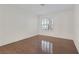 Neutral bedroom with plantation shutters and gleaming wood floors at 4843 S Torrey Pines Dr # 101, Las Vegas, NV 89103