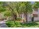 Well-kept condo complex with mature trees, green lawns, and tidy landscaping offering curb appeal at 4843 S Torrey Pines Dr # 101, Las Vegas, NV 89103