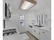 Clean kitchen featuring all-white cabinetry, modern appliances, and abundant natural light at 4843 S Torrey Pines Dr # 101, Las Vegas, NV 89103
