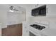 Updated kitchen featuring modern appliances, white cabinets, and an open layout at 4843 S Torrey Pines Dr # 101, Las Vegas, NV 89103