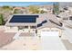 Charming home with solar panels, a three-car garage, and xeriscaped front yard at 4910 Marywood Ct, Pahrump, NV 89061
