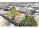 Expansive backyard with desert landscape, mature trees and a storage shed at 4910 Marywood Ct, Pahrump, NV 89061