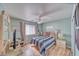 Cozy bedroom with wood-look flooring, a window, ceiling fan and neutral paint at 4910 Marywood Ct, Pahrump, NV 89061
