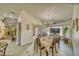 Dining room area with tile flooring, natural light, and access to other rooms at 4910 Marywood Ct, Pahrump, NV 89061