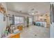 Well-lit office with large windows, storage, and tile flooring at 4910 Marywood Ct, Pahrump, NV 89061