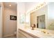 Well-lit bathroom with a double sink vanity and updated fixtures, combining style and functionality at 4911 Mount Pleasant Ln, Las Vegas, NV 89113