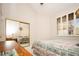 Cozy bedroom features vaulted ceilings, mirrored closet, and soft natural light at 4911 Mount Pleasant Ln, Las Vegas, NV 89113