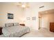 Comfortable bedroom with ample closet space for storage and neutral walls for easy customization at 4911 Mount Pleasant Ln, Las Vegas, NV 89113