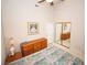Inviting bedroom with dresser, ceiling fan, and mirrored closet at 4911 Mount Pleasant Ln, Las Vegas, NV 89113