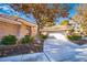 Charming single-story home features a tiled roof, two-car garage, and mature landscaping at 4911 Mount Pleasant Ln, Las Vegas, NV 89113