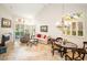 Bright and airy living room with high ceilings, large windows, and a cozy fireplace at 4911 Mount Pleasant Ln, Las Vegas, NV 89113