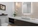 Modern bathroom with sleek vanity, vessel sink, and decorative lighting at 507 Serenity Point Dr, Henderson, NV 89012