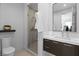 Contemporary bathroom featuring a glass shower and a modern vanity with stylish fixtures at 507 Serenity Point Dr, Henderson, NV 89012