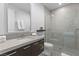 Modern bathroom with sleek vanity, glass-enclosed shower, and contemporary design at 507 Serenity Point Dr, Henderson, NV 89012