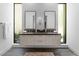 Elegant bathroom with dual sinks, a modern vanity, and ample natural light at 507 Serenity Point Dr, Henderson, NV 89012
