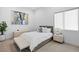 Modern bedroom featuring a comfortable bed, stylish decor, and neutral color palette at 507 Serenity Point Dr, Henderson, NV 89012