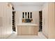 Well-organized walk-in closet with custom shelving, drawers, and ample storage space at 507 Serenity Point Dr, Henderson, NV 89012