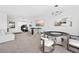 Spacious game room area with multiple poker tables for entertaining guests at 507 Serenity Point Dr, Henderson, NV 89012